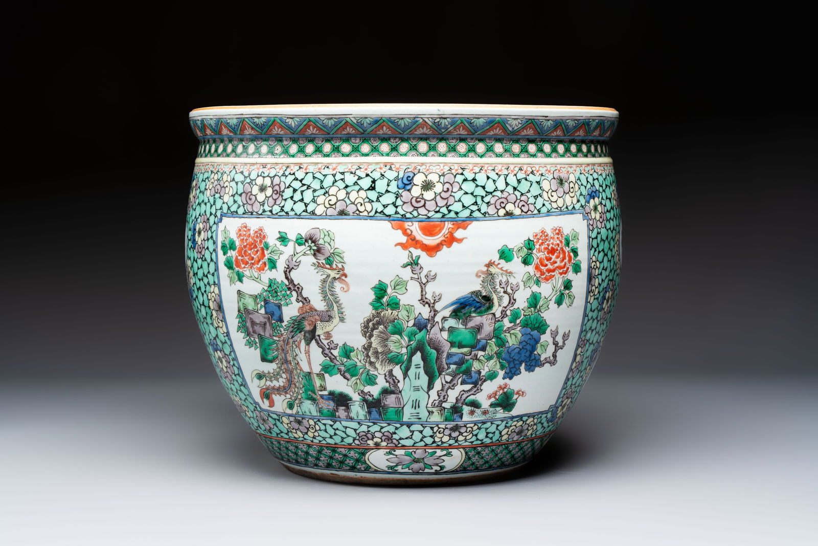 A Chinese famille verte 'Phoenix and Mountainous Landscape' jardinière, 19th C. (1 of 7)