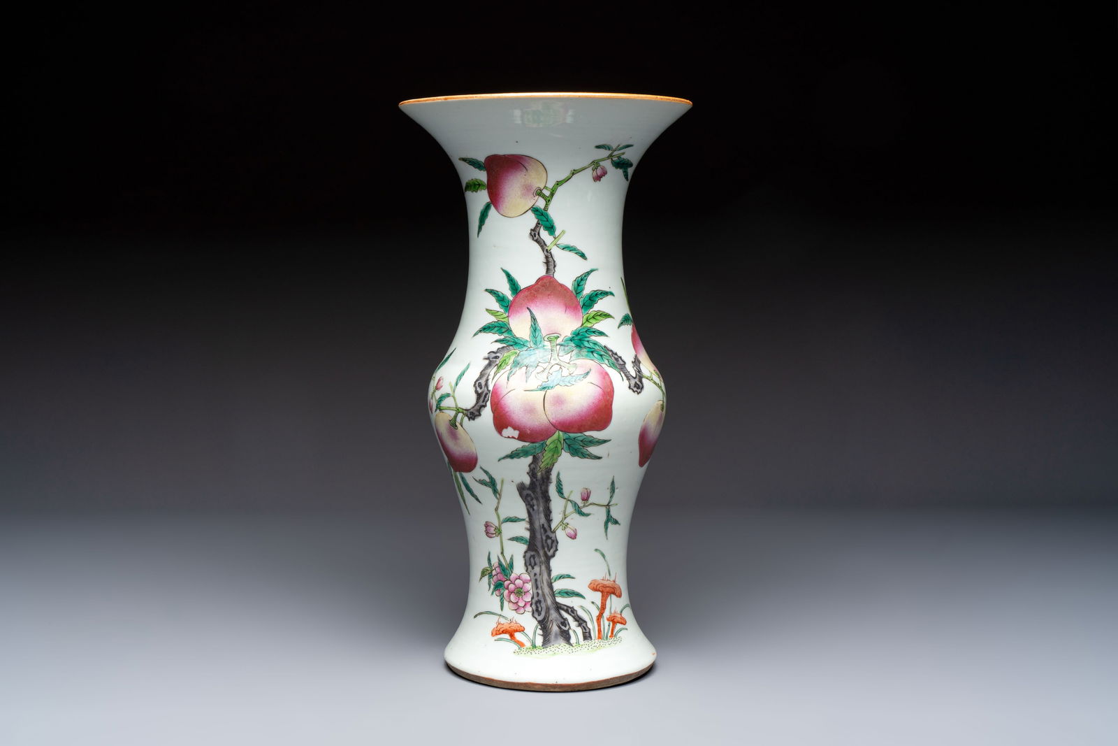 A Chinese famille rose 'Nine Peaches' 'Gu' vase, 19th C. (1 of 6)