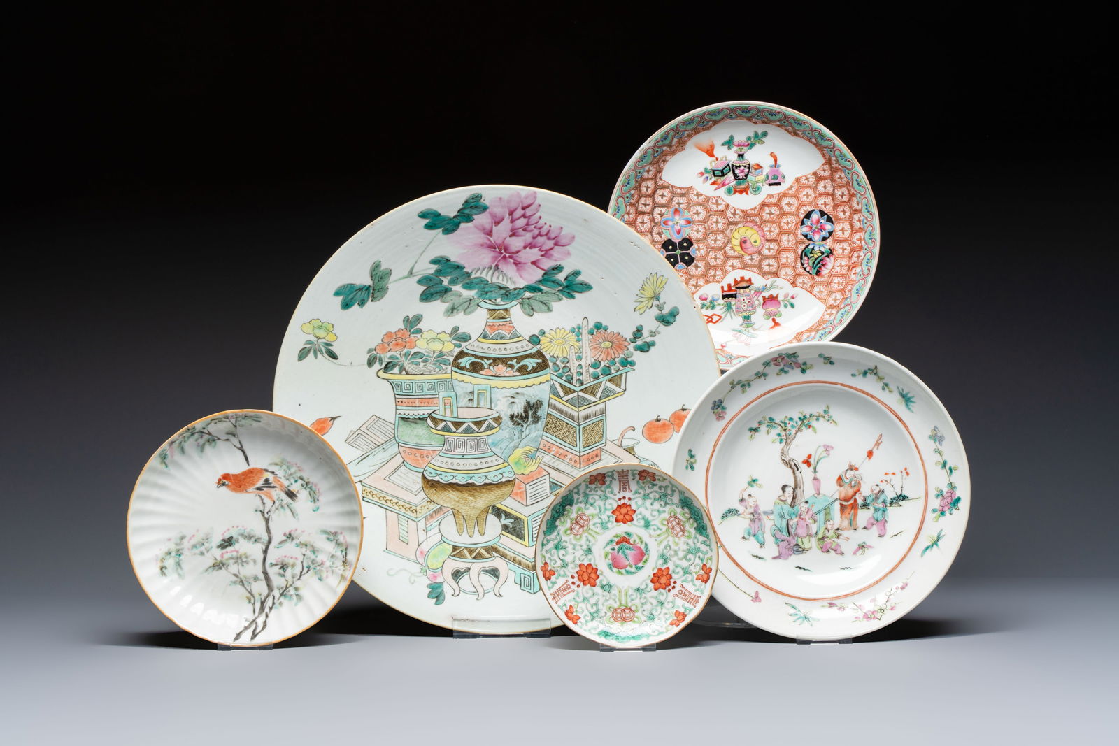 A Chinese qianjiang cai dish and a plate, two famille rose plates and a saucer, Chenghua, Yongzheng (1 of 7)
