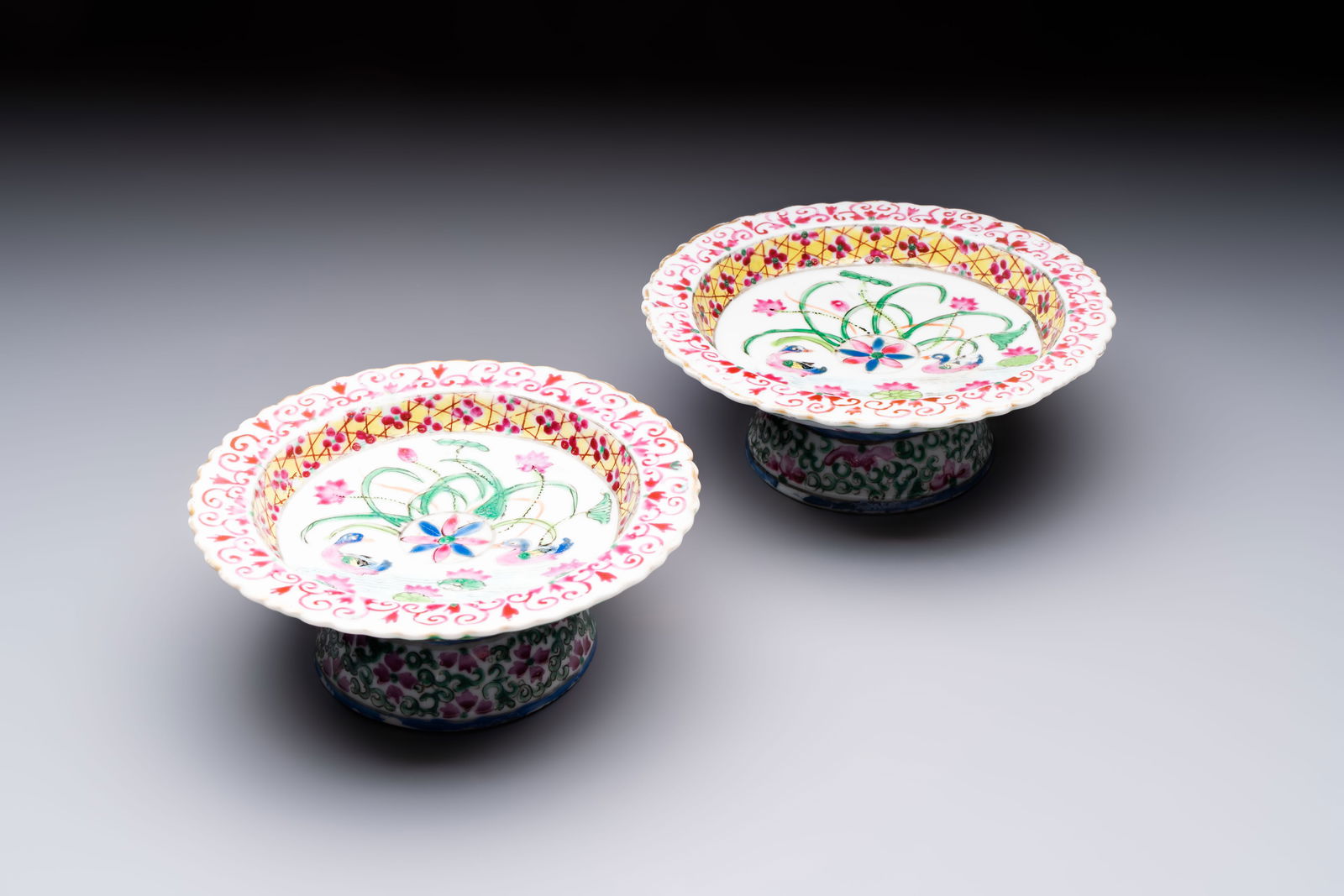 A pair of Chinese famille rose 'mandarin ducks in a lotus pond' Bencharong tazzas for the Thai (1 of 8)