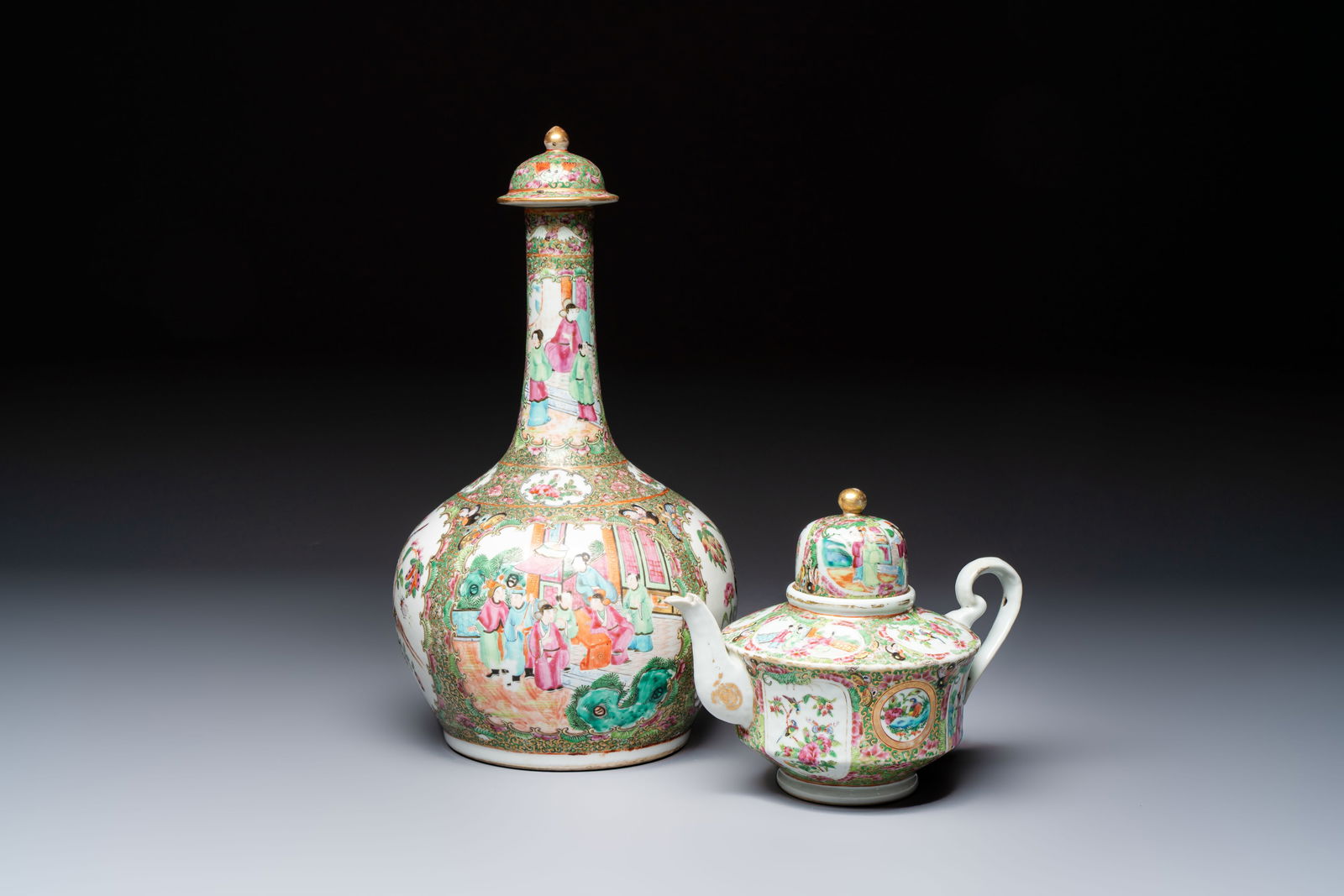 A Chinese Canton famille rose covered bottle vase and a teapot, 19th C. (1 of 13)