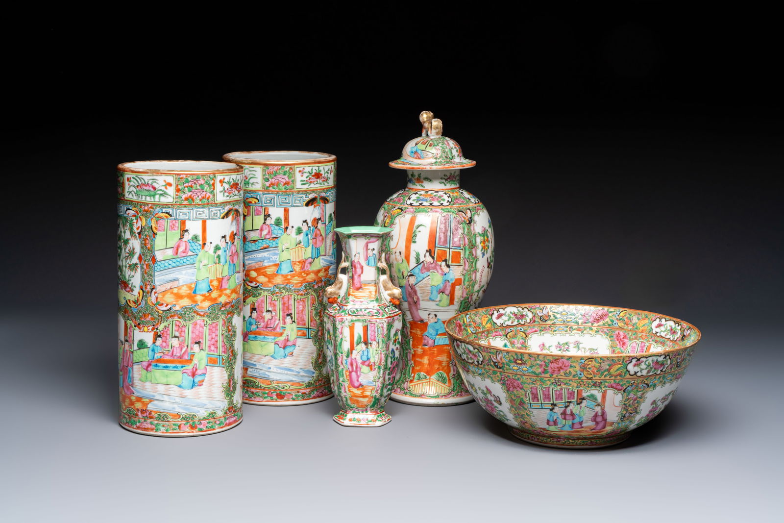 A pair of Chinese Canton famille rose hat stands, a covered vase, a vase and a bowl, 19th C. (1 of 19)