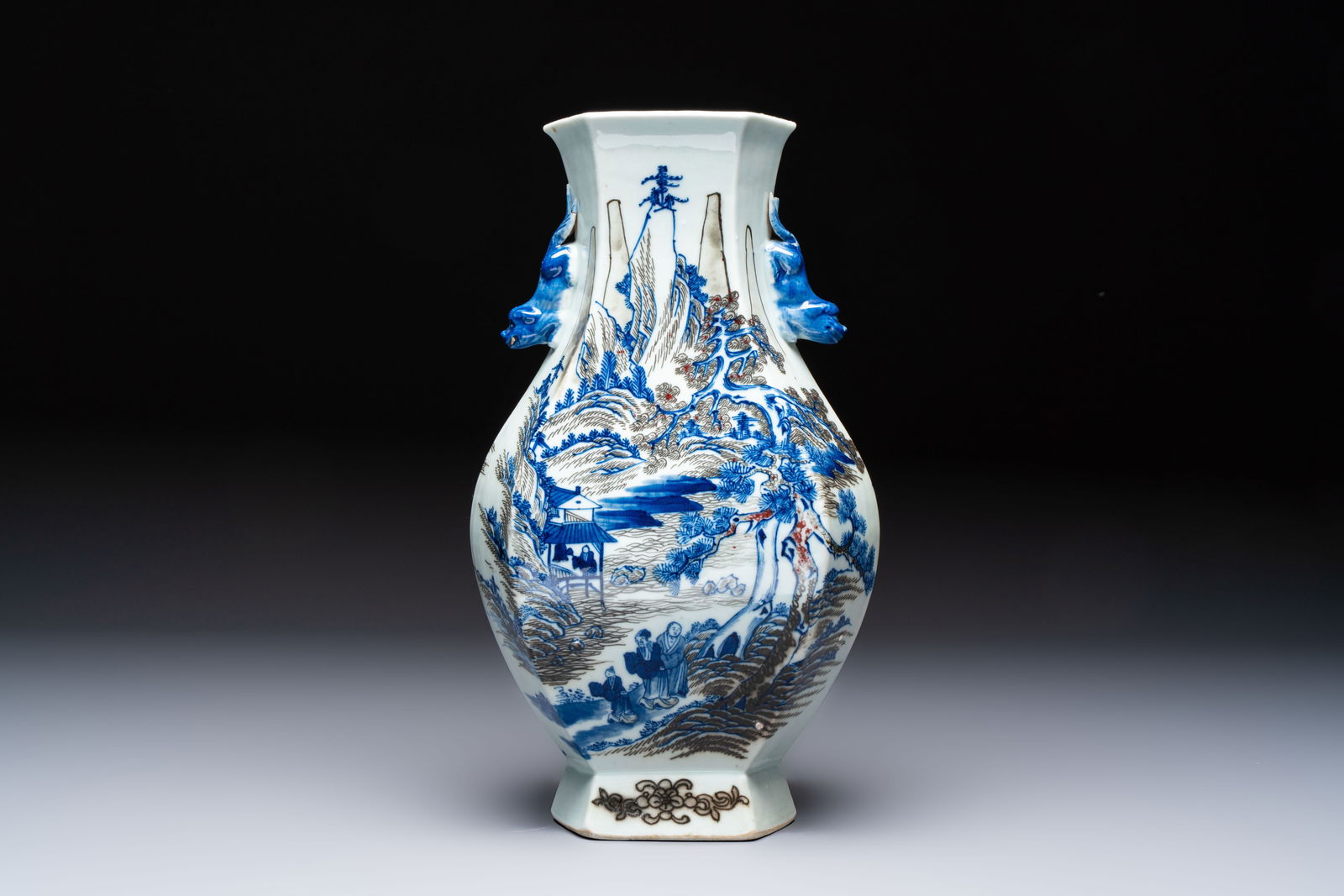 A Chinese blue, white and copper-red 'Hu' vase with figures in a mountainous landscape, 19th C.: A Chinese blue, white and copper-red 'Hu' vase with figures in a mountainous landscape, 19th C. H.: 34 cm Ref.: - Rob Michiels Auctions, 14 May 2022, lot 35 for a quasi identical example. (sold EUR 2.