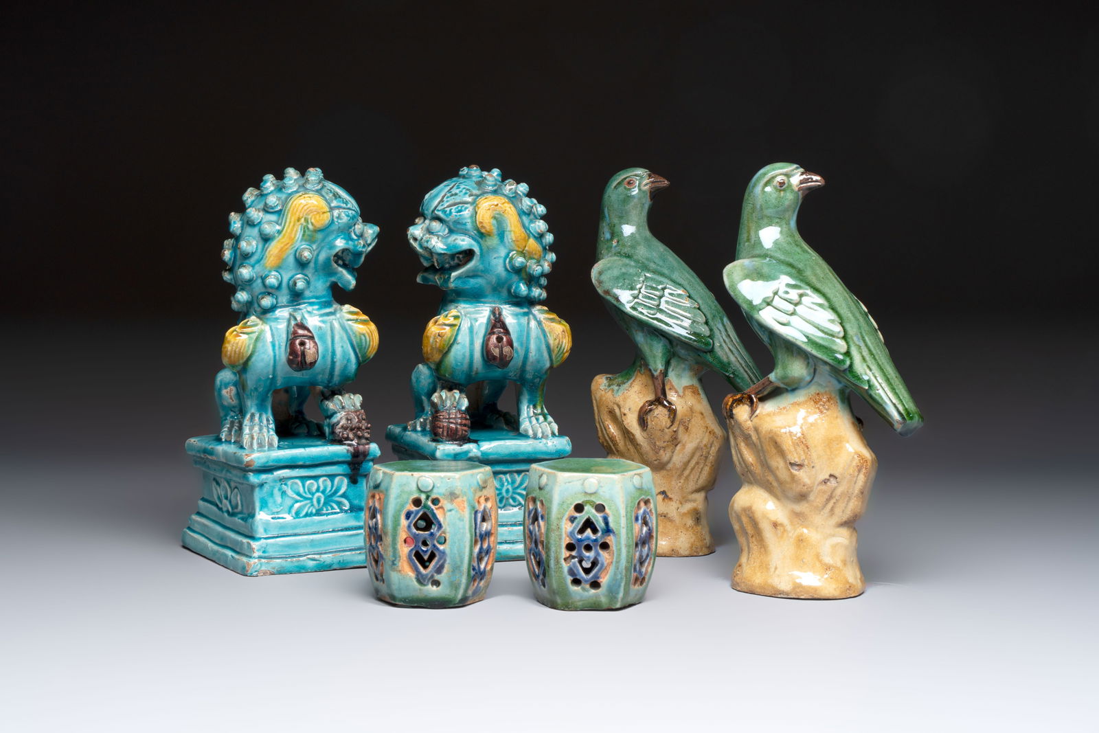 A pair of Chinese turquoise-glazed Buddhist lions, a pair of green-glazed parrots and a pair of (1 of 19)