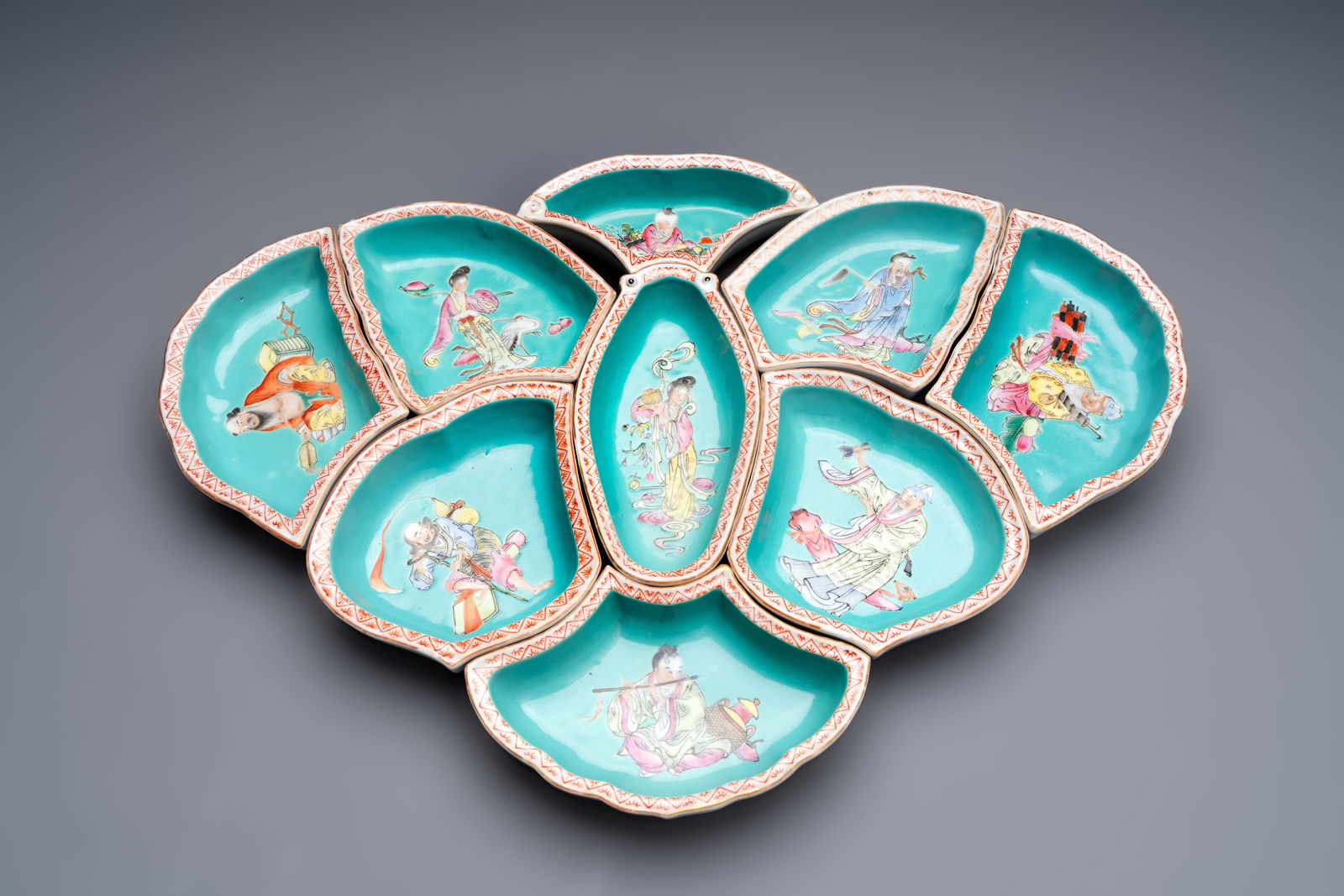 A rare Chinese famille rose turquoise-ground nine-piece 'butterfly' sweetmeat set with immortals, (1 of 9)