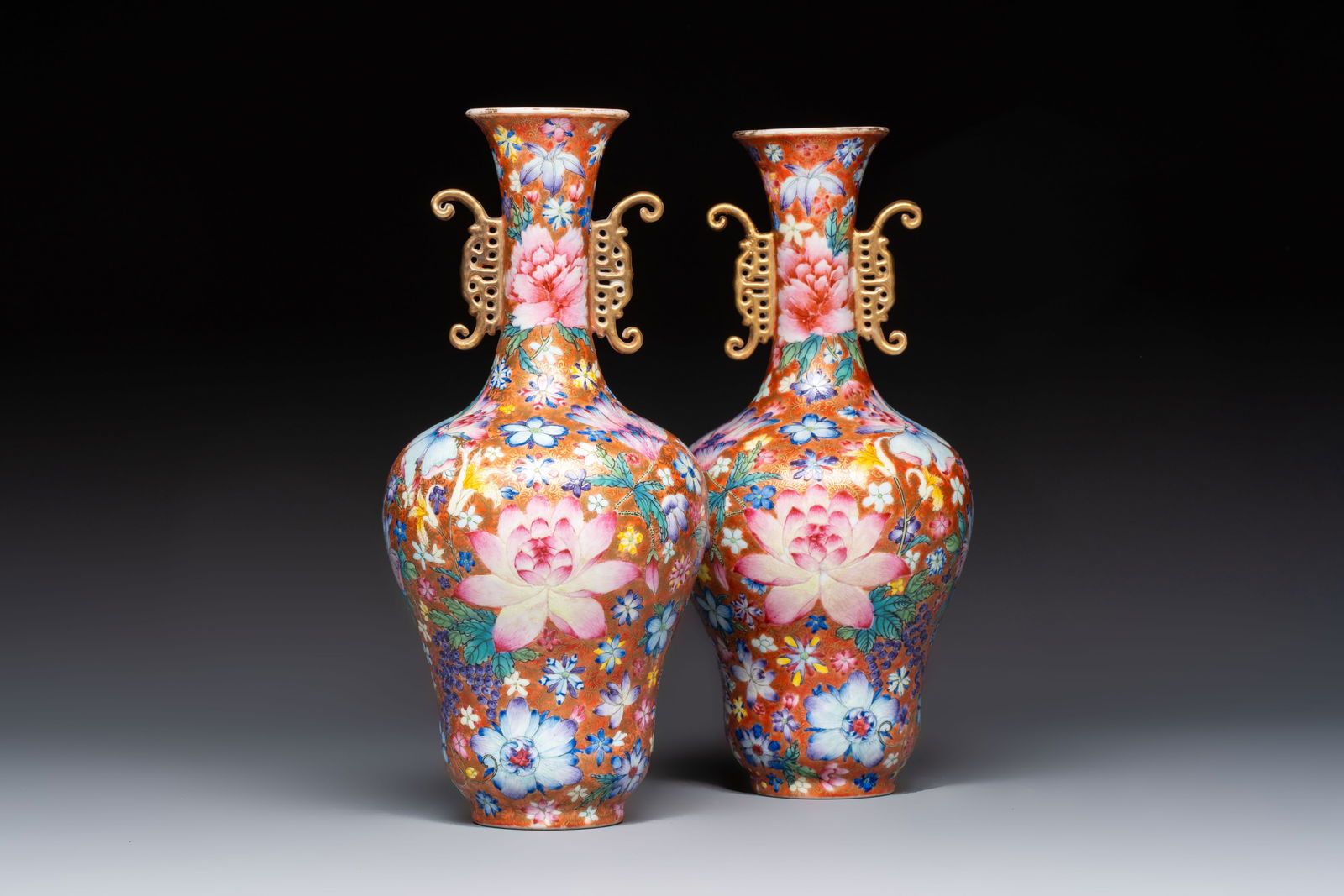 A pair of Chinese famille rose 'Millefleur' vases, Qianlong mark, Republic: A pair of Chinese famille rose 'Millefleur' vases, Qianlong mark, Republic H.: 25 cm