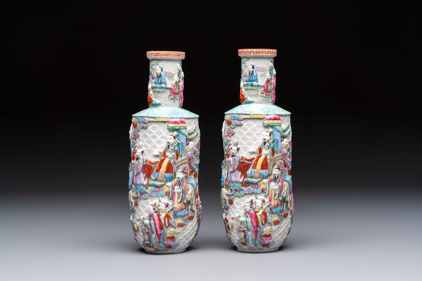A pair of Chinese famille rose relief-moulded 'Immortals' vases, Qianlong mark, Republic (1 of 6)
