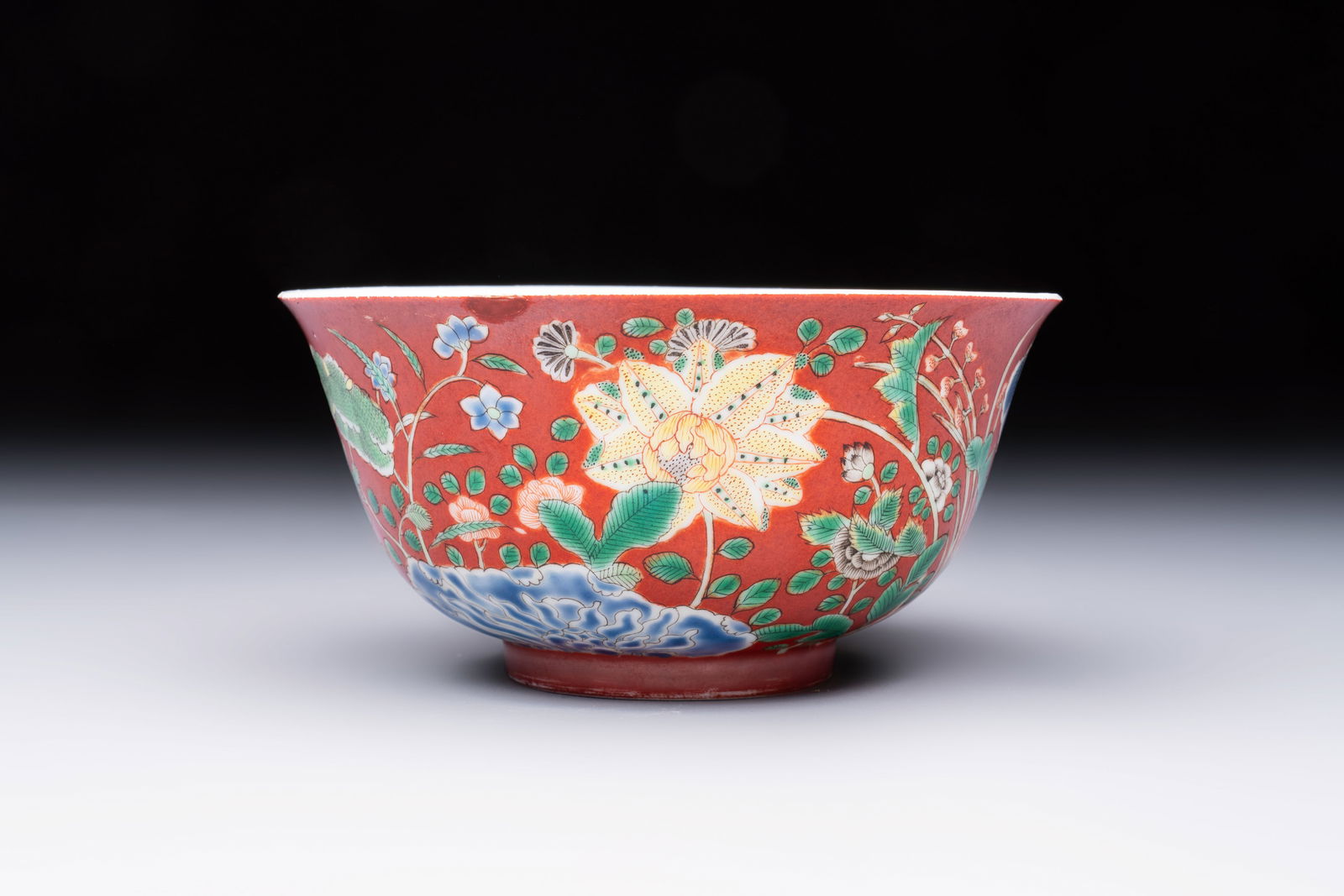 A Chinese falancai coral-red-ground bowl, Yongzheng mark, 18/19th C. (1 of 6)