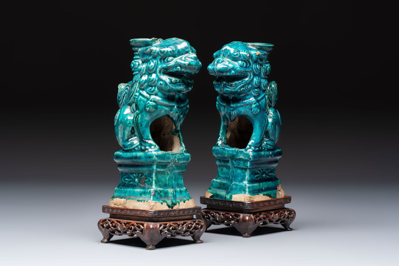 A pair of Chinese turquoise-glazed lion-shaped joss stick holders on wooden stands, Ming (1 of 8)