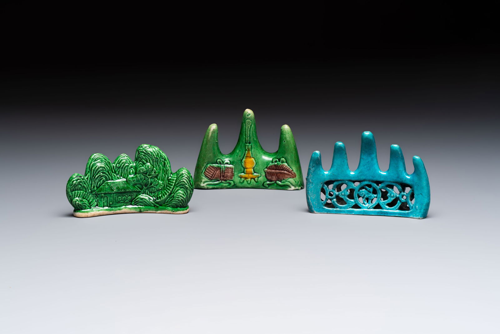 Three Chinese verte biscuit and turquoise-glazed brush rests, Kangxi and later (1 of 7)
