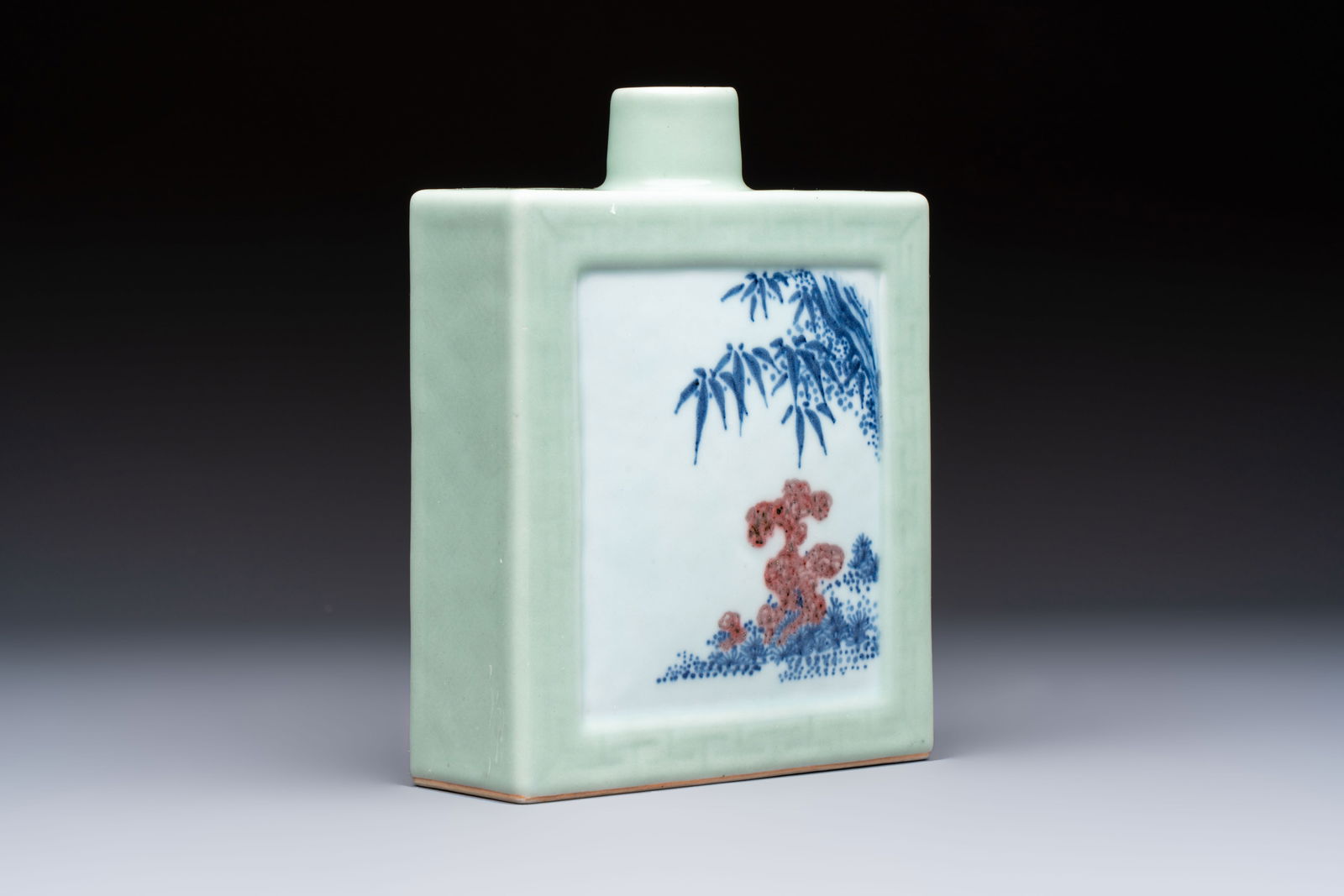 A Chinese blue, white and copper-red celadon-ground tea caddy with floral and bamboo design, (1 of 7)