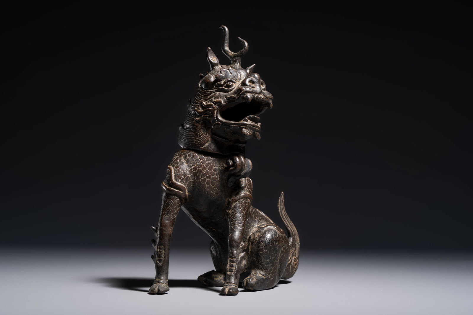 A Chinese bronze 'Qilin' censer, Ming (1 of 10)