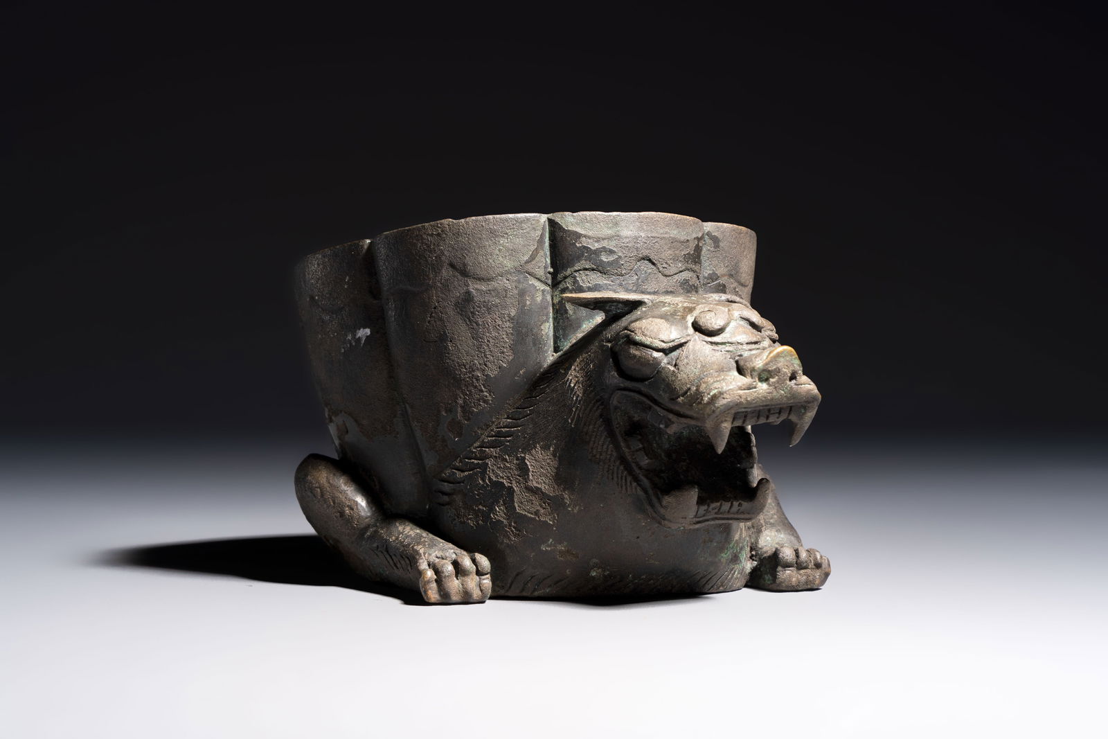A Chinese bronze 'Mythical Beast' rhyton, Ming (1 of 7)