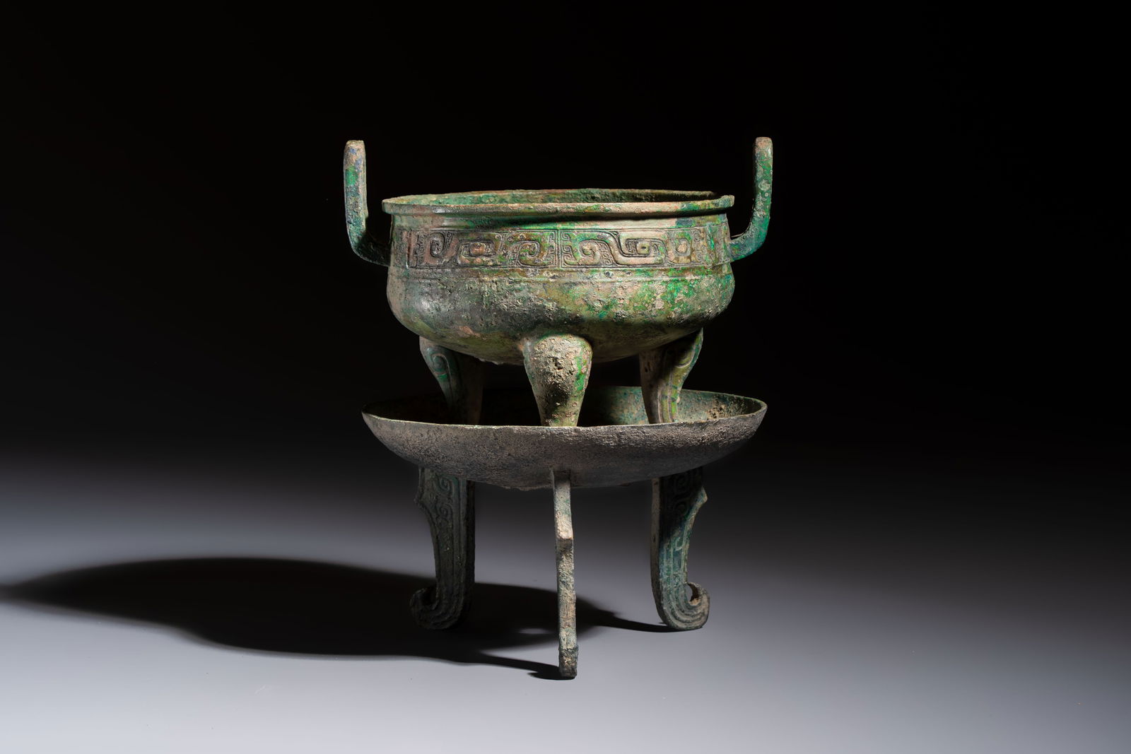 An inscribed Chinese archaic bronze food vessel and stand, You Pan Ding, Western Zhou (1 of 7)