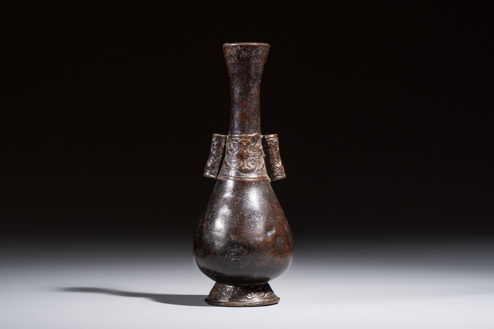 A Chinese bronze arrow vase, touhu, Yuan (1 of 6)