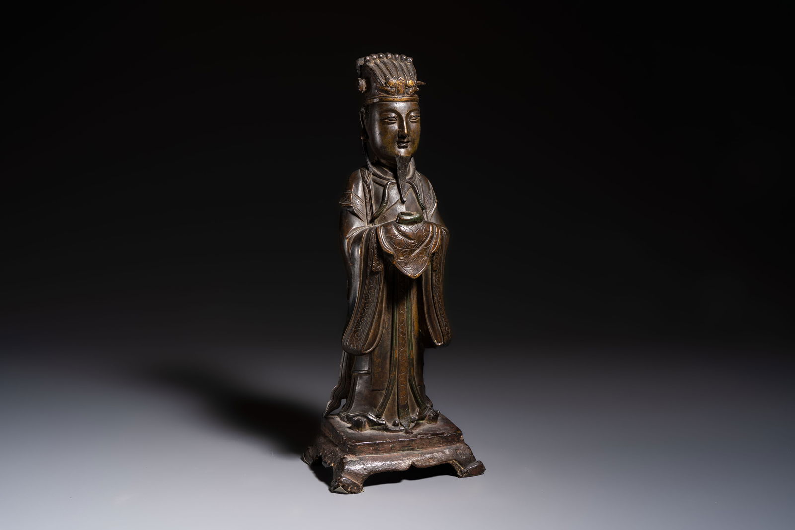A Chinese bronze figure of an official, Ming (1 of 7)