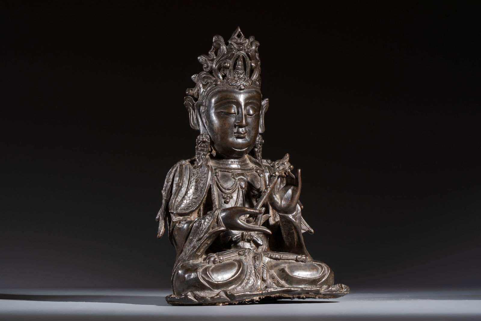 A fine Chinese bronze figure of Bodhisattva holding a ruyi, Ming (1 of 7)