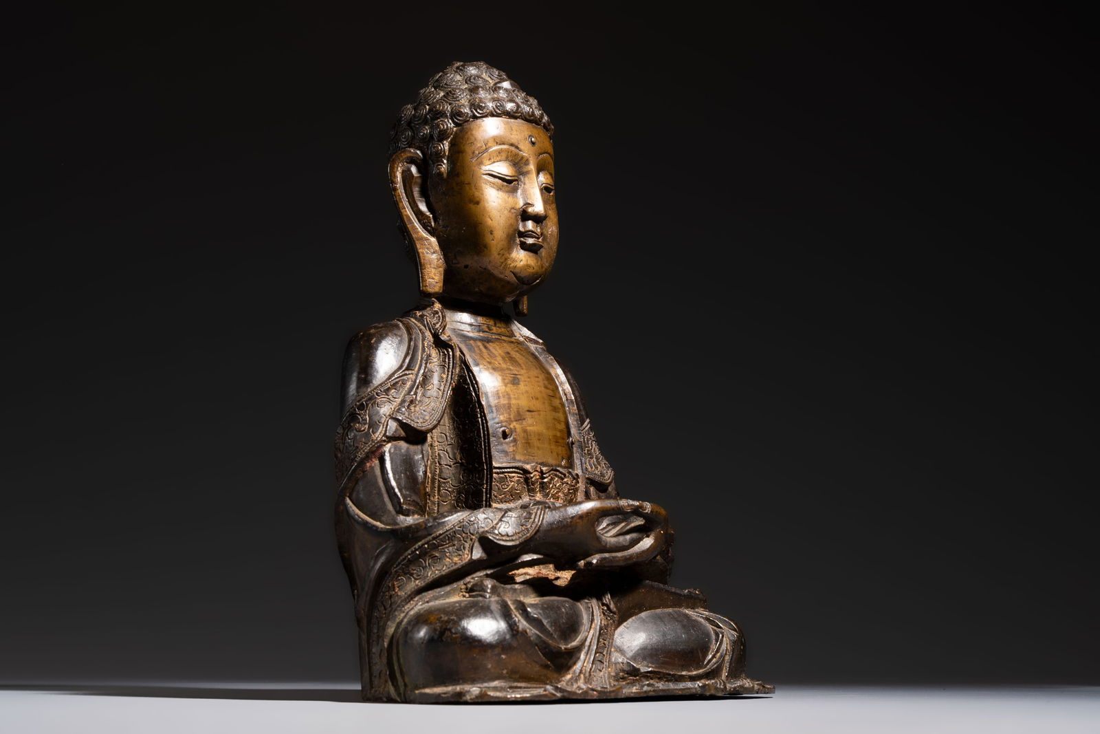 A Chinese bronze figure of Buddha, Ming (1 of 7)