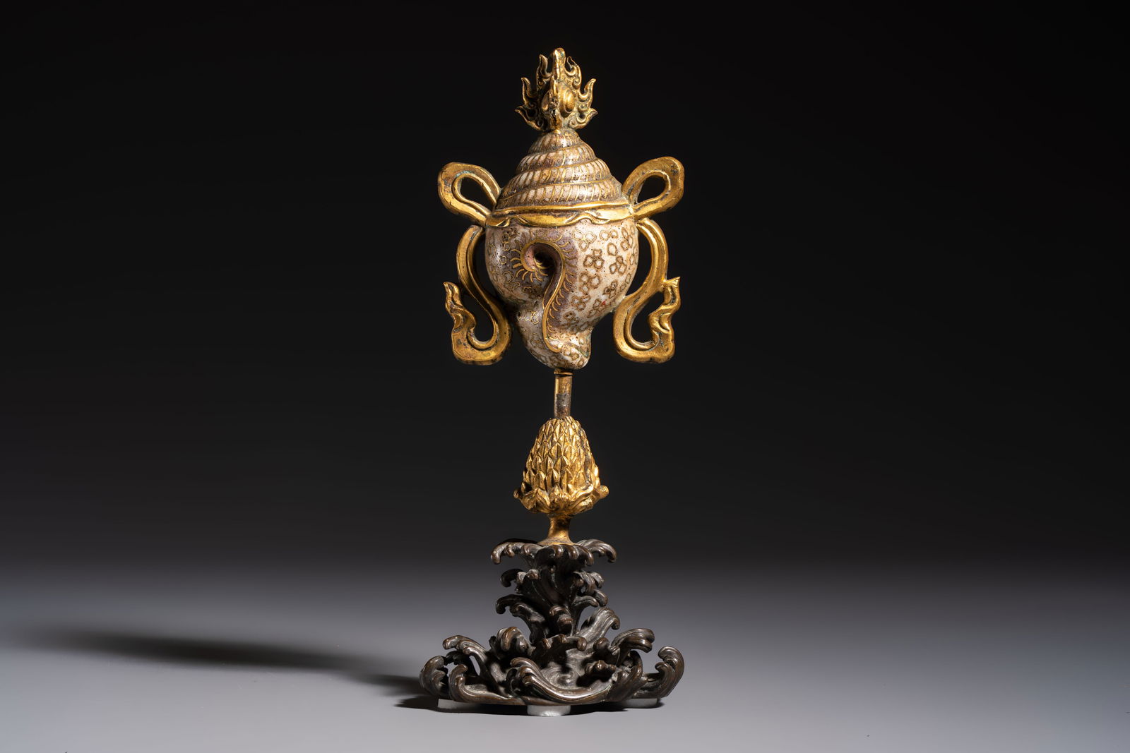 A Chinese parcel-gilt cloisonné and bronze 'Conch Shell' Buddhist emblem, 18/19th C. (1 of 6)