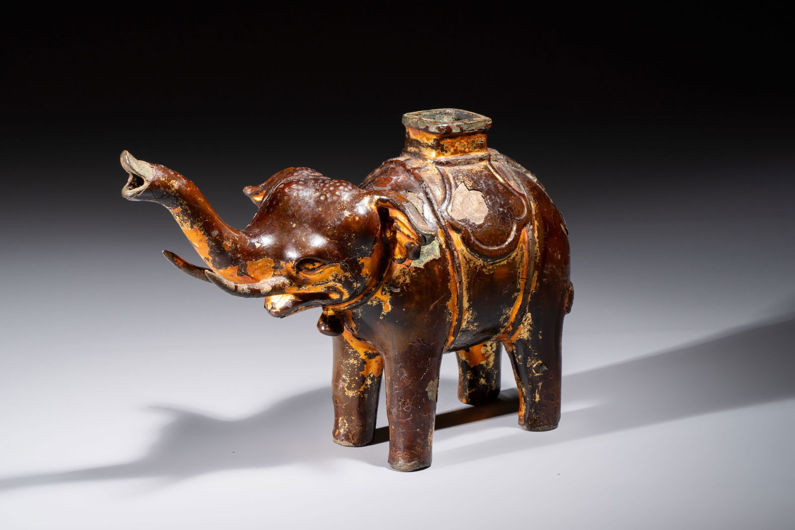 A Vietnamese gilt-lacquered bronze 'Elephant' ewer, 19th C. (1 of 7)