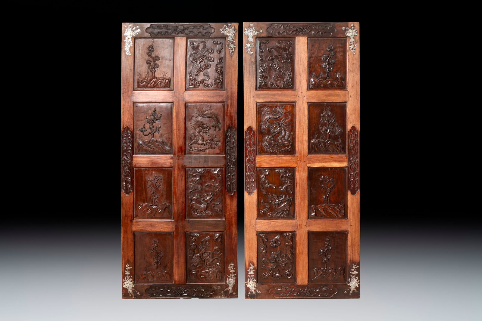 A pair of Vietnamese mother-of-pearl-inlaid hardwood 'Four Symbols' panels, 19th C.: A pair of Vietnamese mother-of-pearl-inlaid hardwood 'Four Symbols' panels, 19th C. Dim.: 88 x 4 x 210 cm