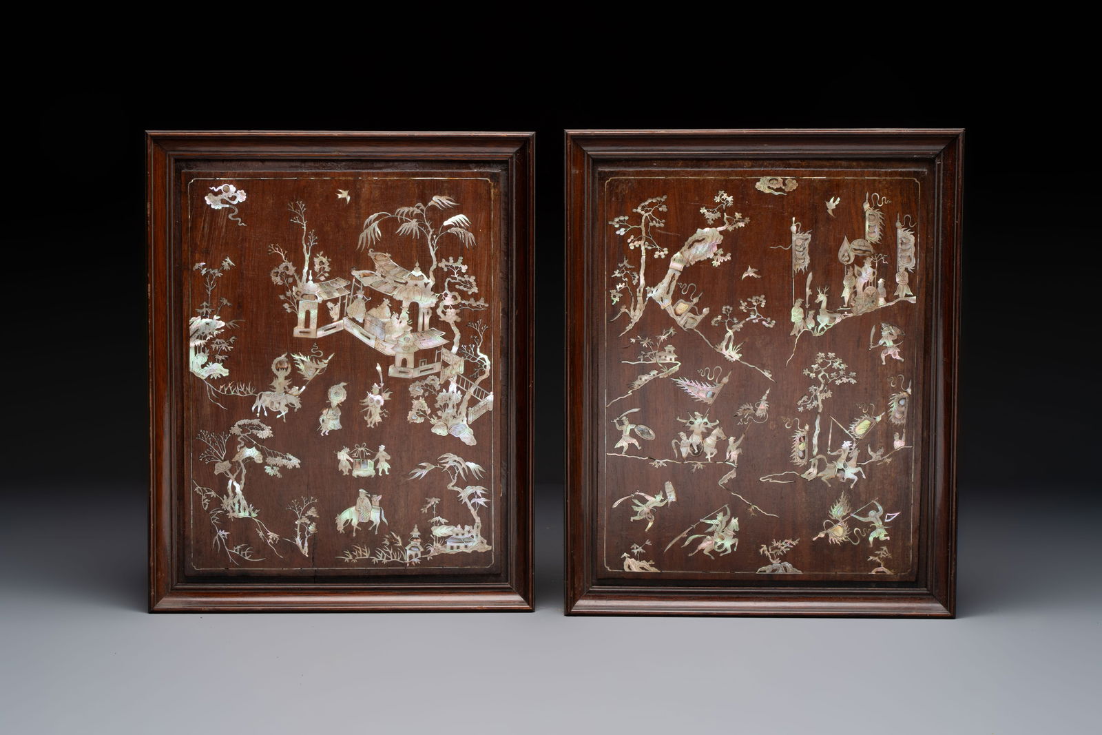A pair of Vietnamese mother-of-pearl-inlaid hardwood plaques with narrative design, 19th C. (1 of 2)