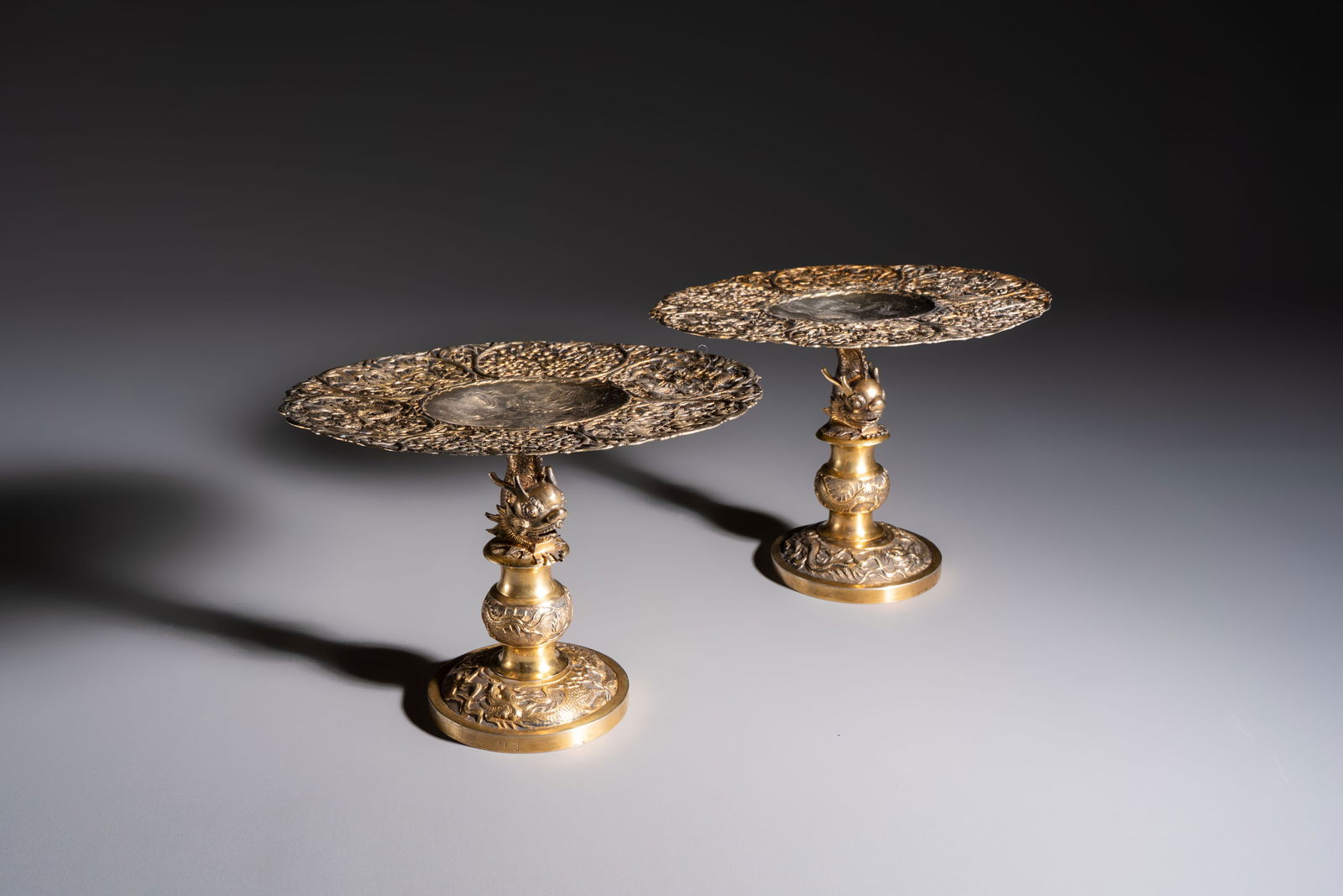A pair of Chinese gilt-silver 'Dragon' tazzas, Heng Lai marks, 19/20th C. (1 of 7)