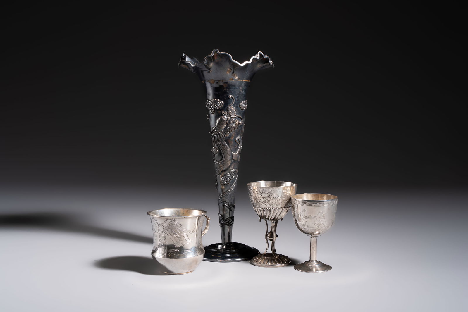 A Chinese silver 'Dragon' vase, two stem cups and a handled cup, various marks, 19/20th C. (1 of 13)