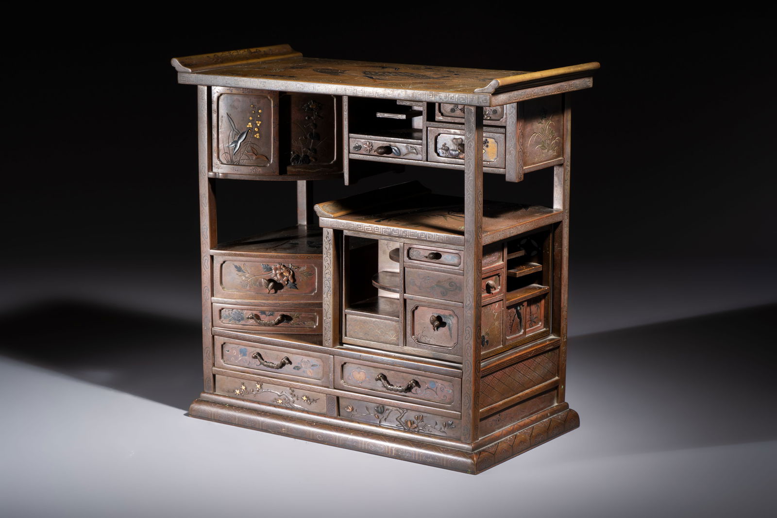 A fine Japanese bronze silver-, gold- and copper-inlaid miniature shodana cabinet, Meiji, 19th C.: A fine Japanese bronze silver-, gold- and copper-inlaid miniature shodana cabinet, Meiji, 19th C. Dim.: 29,5 x 15 x 28,3 cm Weight: 12,8 kilograms