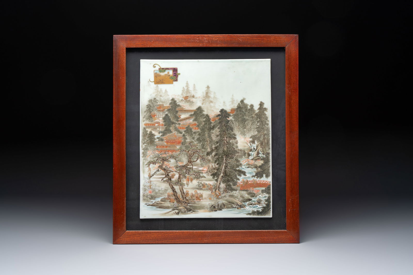 A Japanese gilt polychrome-decorated 'Mountainous landscape' porcelain plaque, Nikkozan mark, Meiji, (1 of 2)