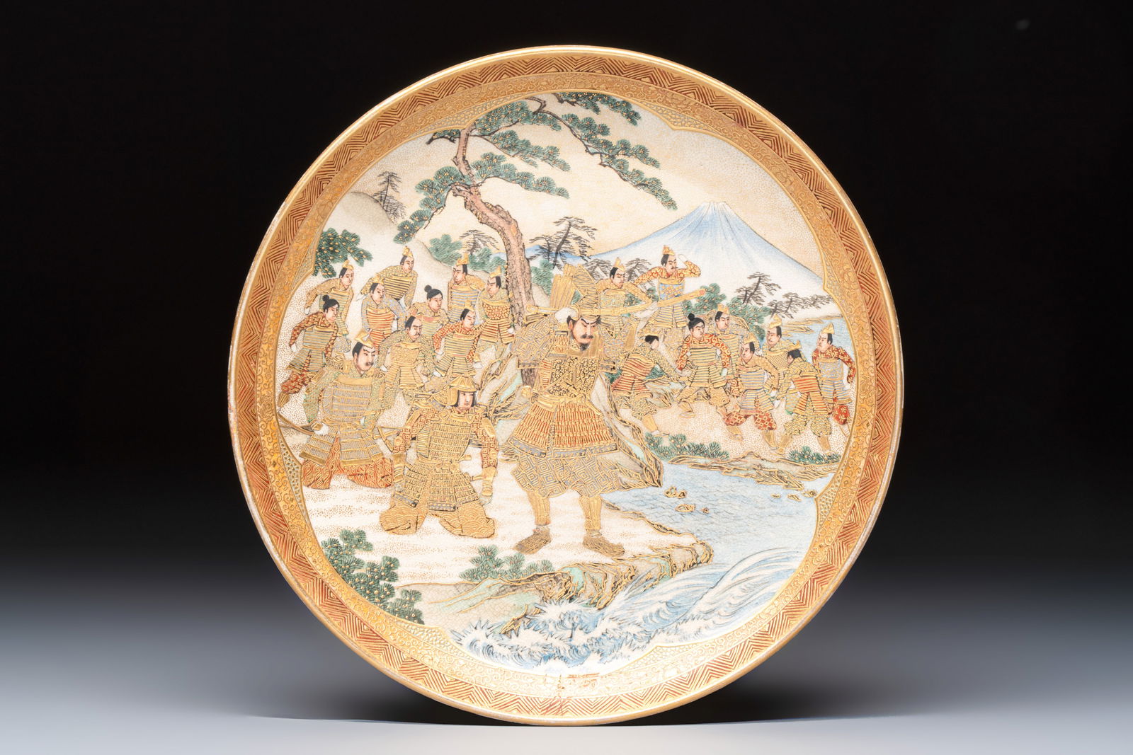 A fine Japanese Satsuma 'Samurai' plate, Meigyokuzan mark, Meiji, 19th C. (1 of 3)