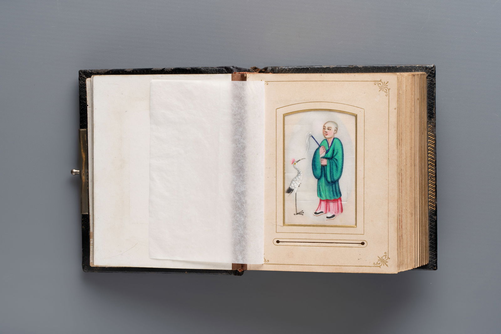 An album containing 36 Chinese Canton rice paper paintings, 19th C.: An album containing 36 Chinese Canton rice paper paintings, 19th C. Dim.: 16 x 14 x 7 cm (the album) Dim.: ca. 11,5 x 7,5 cm (the works)