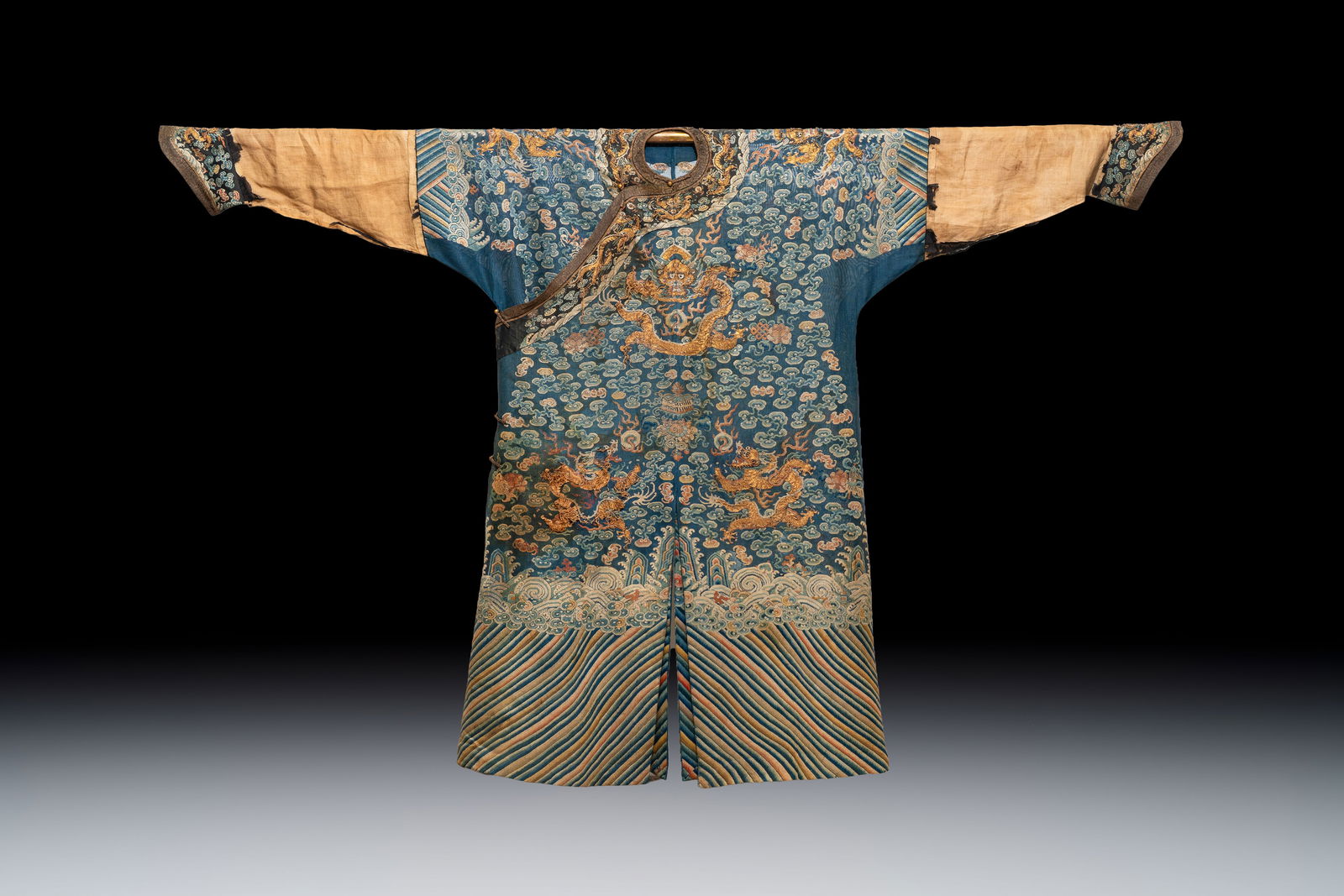 A Chinese silk blue-ground summer gauze 'Dragons' robe, 19th C. (1 of 5)