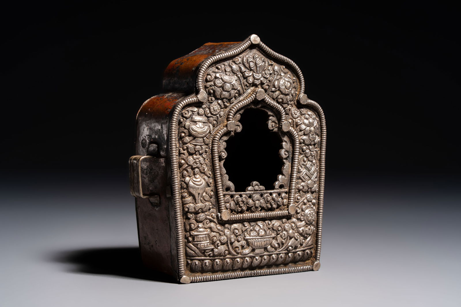 A Tibetan silver and copper Ghau or prayer box, 19th C. (1 of 7)
