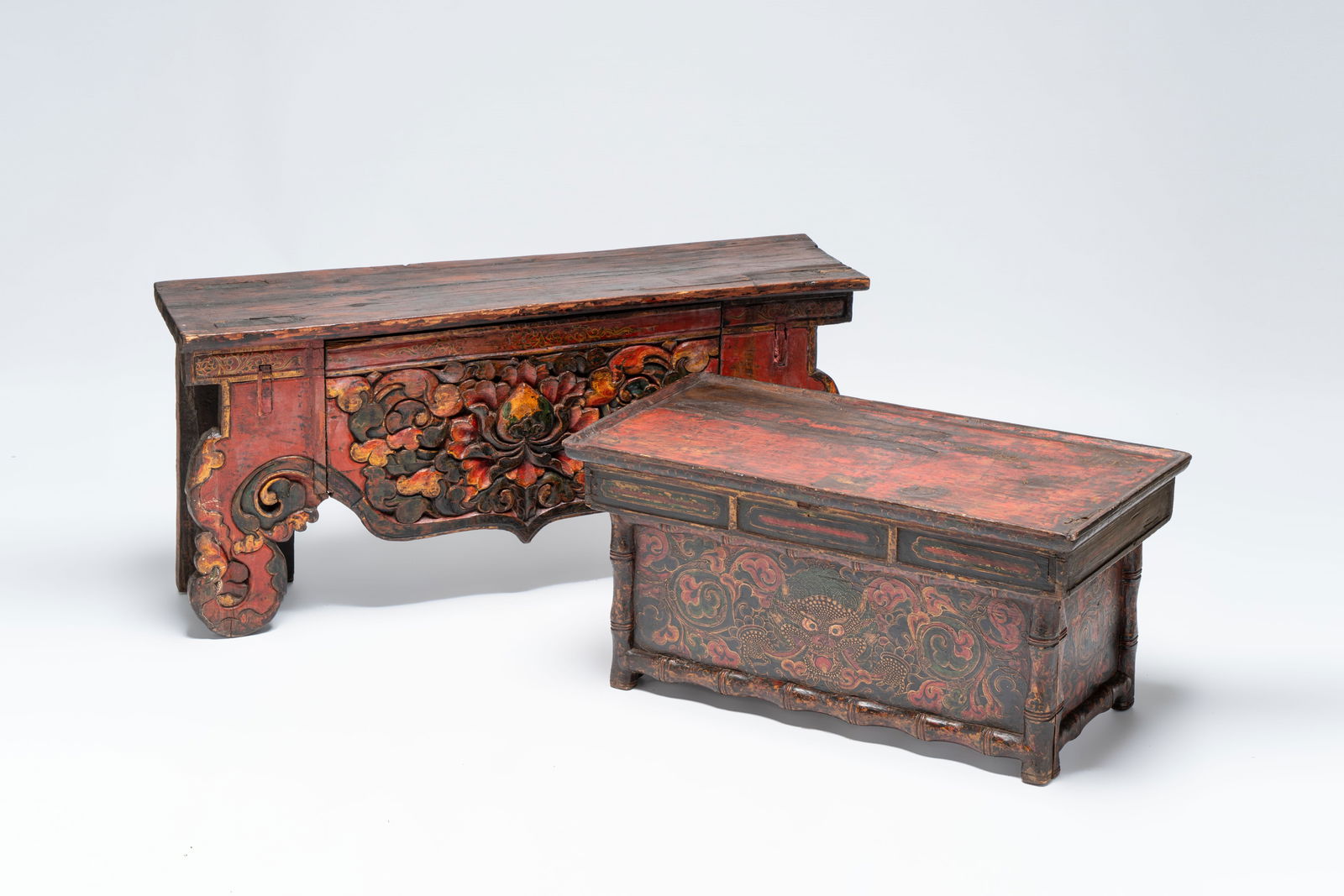 A Tibetan finely painted polychrome wooden folding table and an altar table, 18/19th C. (1 of 13)