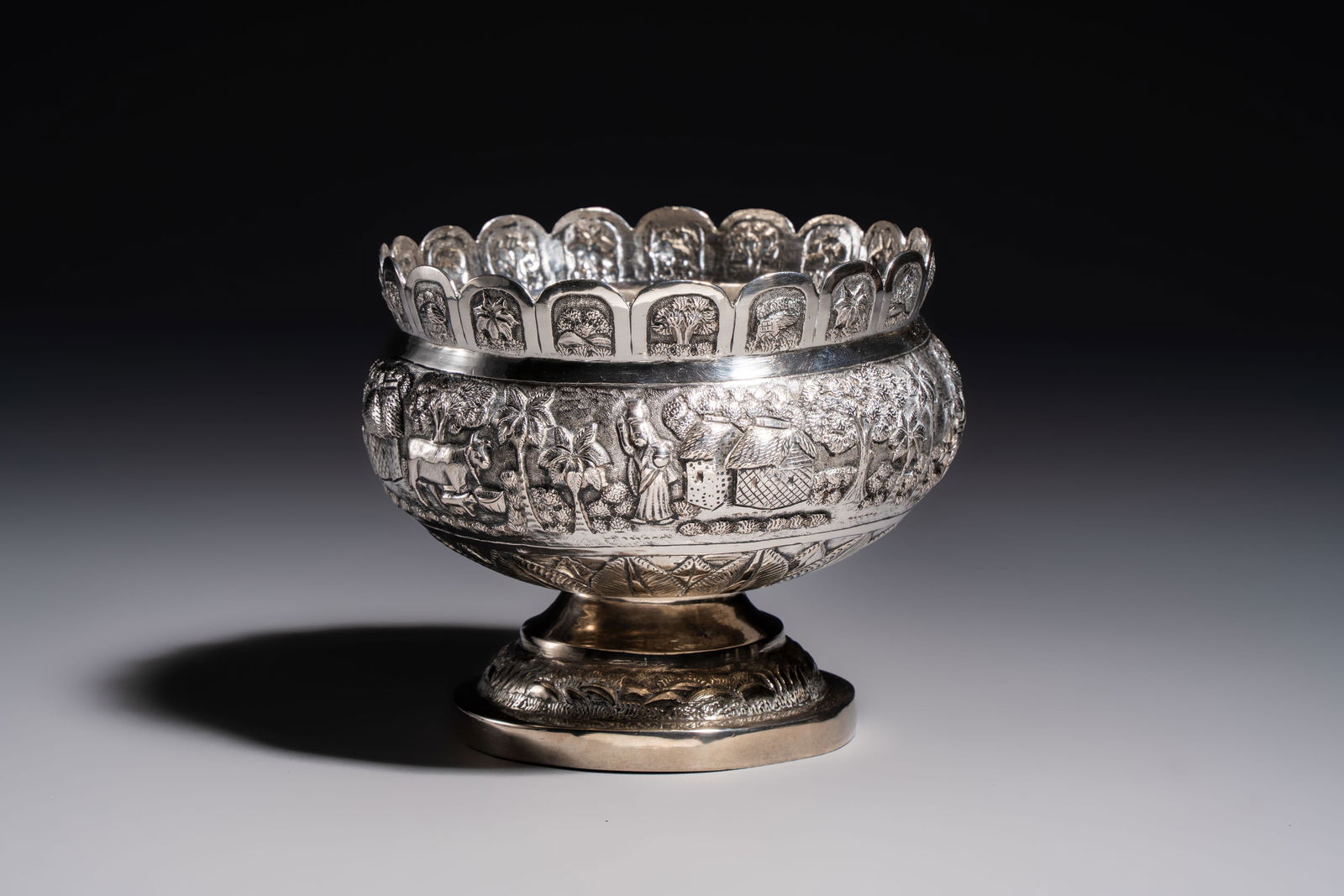 An Indian repoussé silver footed bowl, early 20th C. (1 of 7)