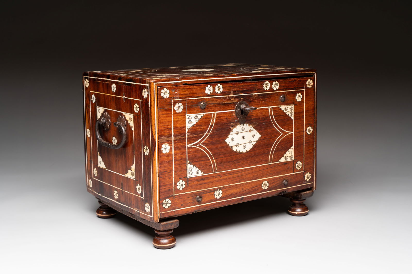 An Indo-Portuguese ivory-inlaid rosewood table cabinet, Gujarat or Sindh, 17th C. (1 of 14)