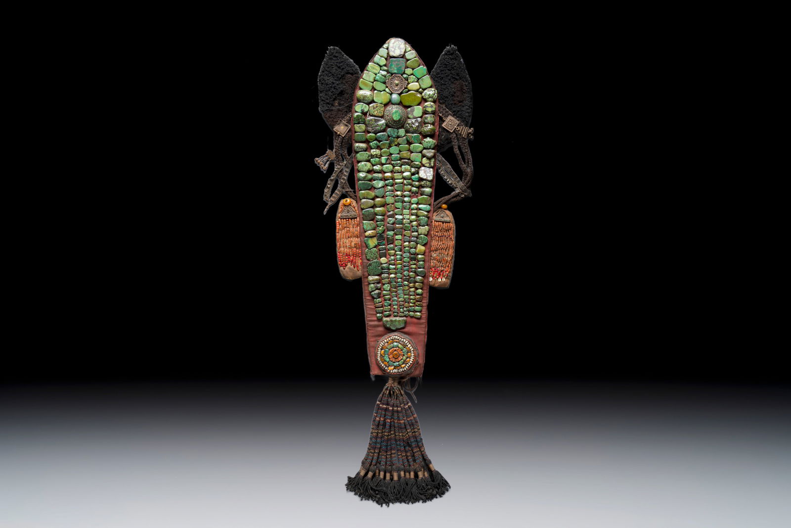 A large ancestral headdress or Perak mounted with turquoise, coral, and other stones, Ladakh, India,: A large ancestral headdress or Perak mounted with turquoise, coral, and other stones, Ladakh, India, 19/20th C. Dim.: 12,5 x 16 x 7,5 cm This fine Perak features large, old turquoise stones with rich,