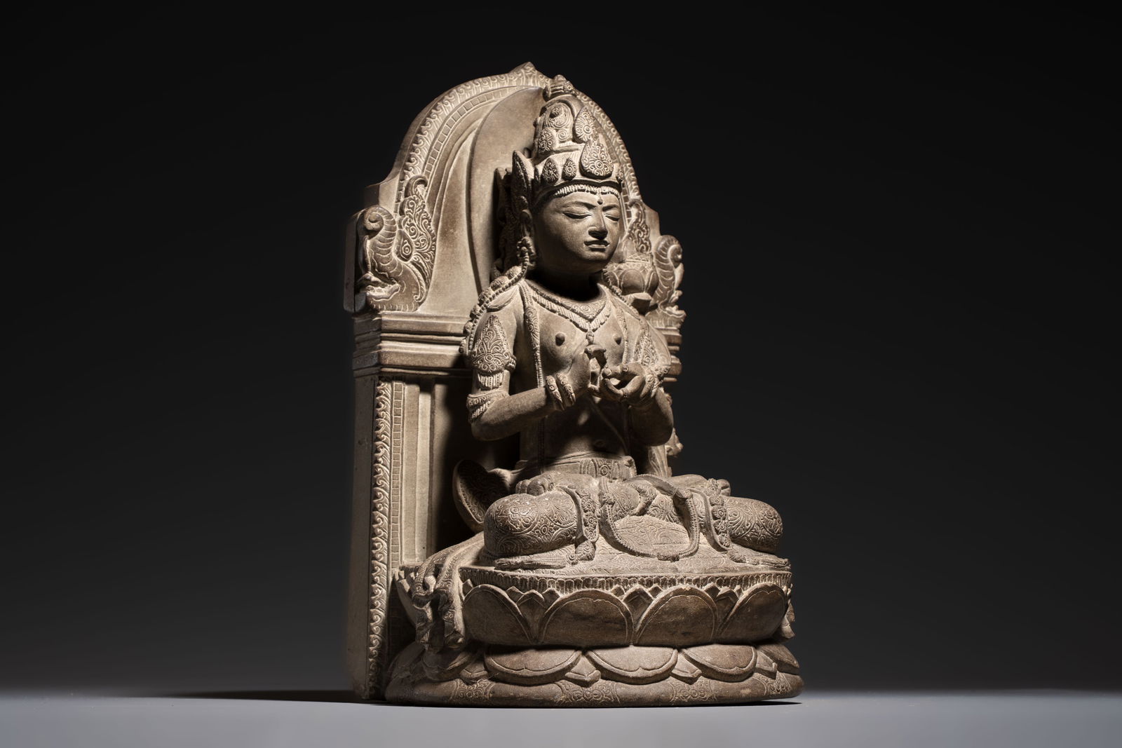 A Javanese carved stone figure of Prajnaparamita, 20th C. (1 of 7)