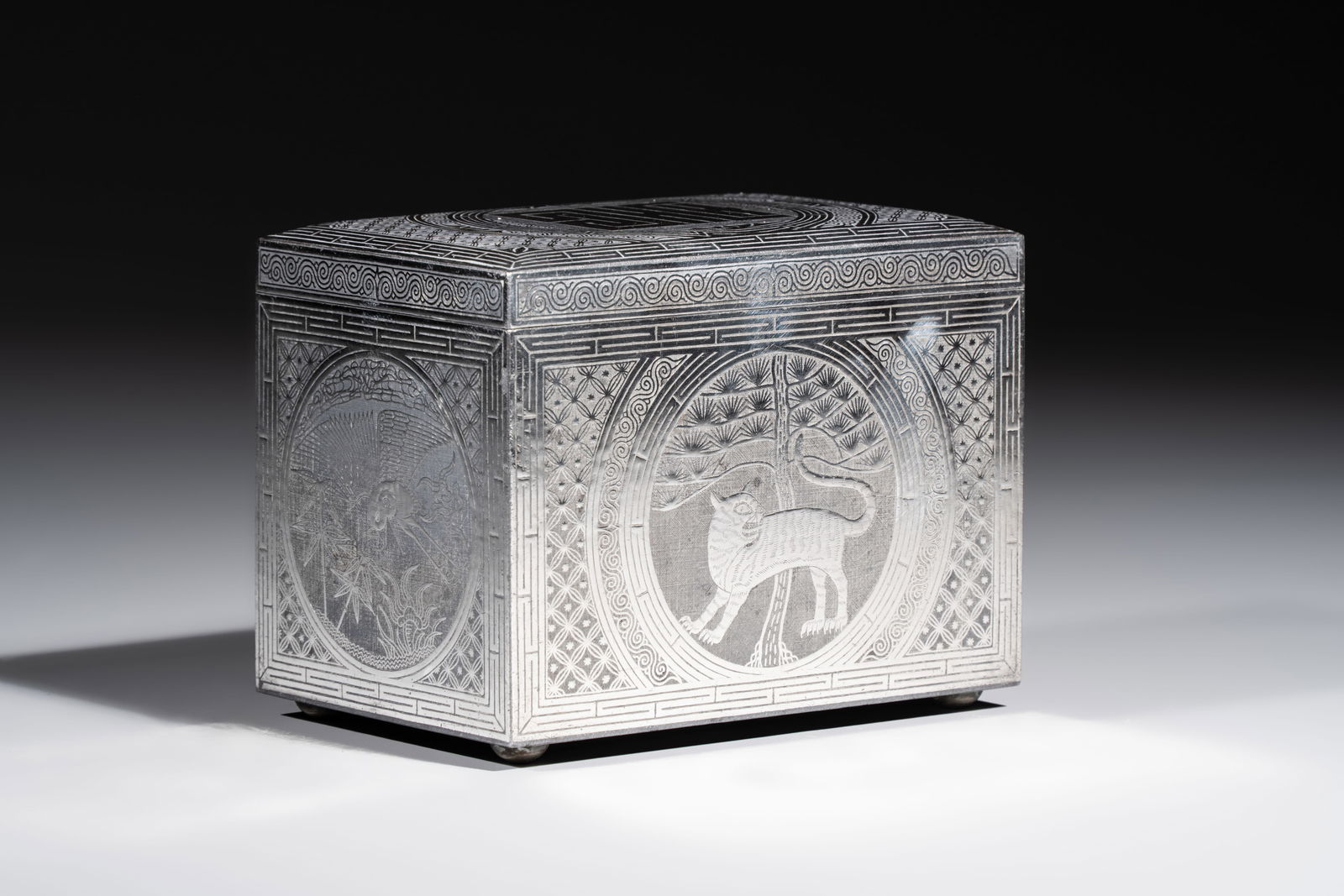 A Korean silver and iron covered box with auspicious motifs, Joseon, 19th C. (1 of 8)