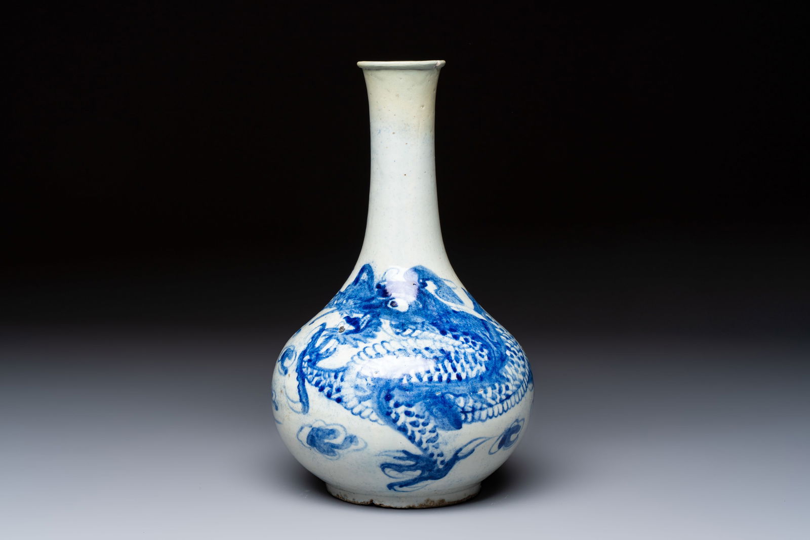 A Korean blue and white 'Dragon' bottle vase, Joseon, 19th C. (1 of 6)