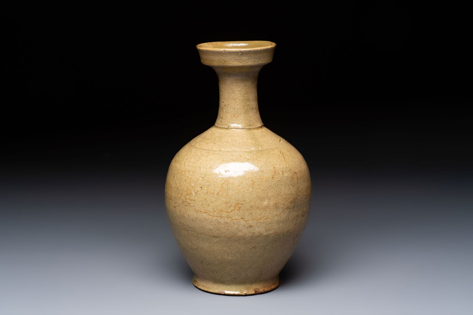 A Korean celadon-glazed sake bottle, Goryeo, 11th C. (1 of 6)