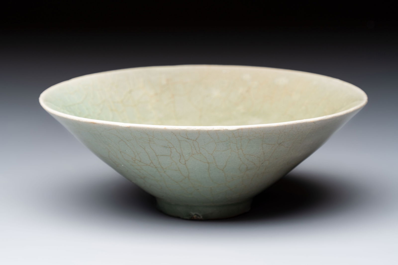 A Korean celadon conical tea bowl, Goryeo, 12th C. (1 of 7)