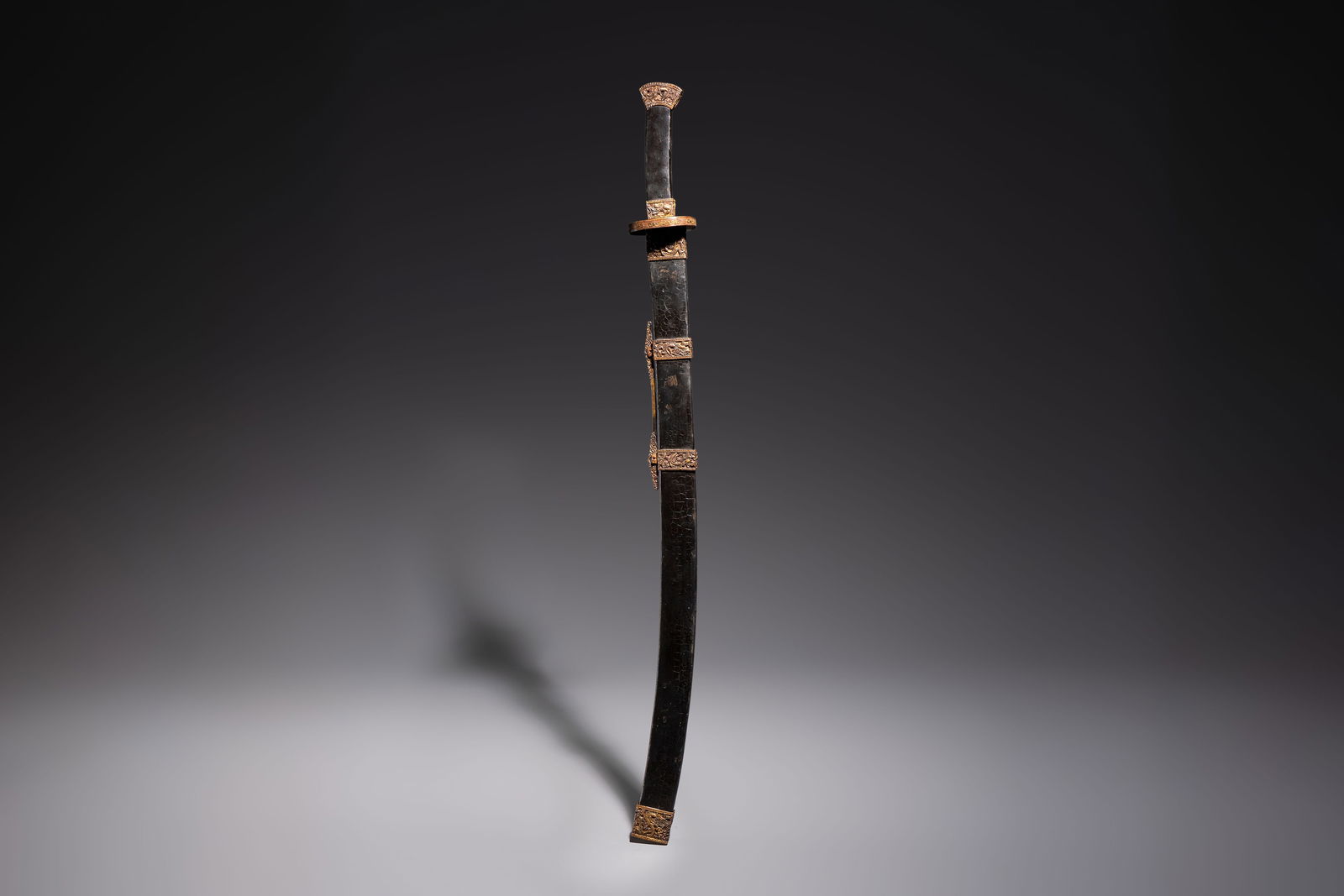 A Chinese palace guard sword 'Dao' inscribed 'Da Nei Shi Wei', with lacquered wooden scabbard and (1 of 7)