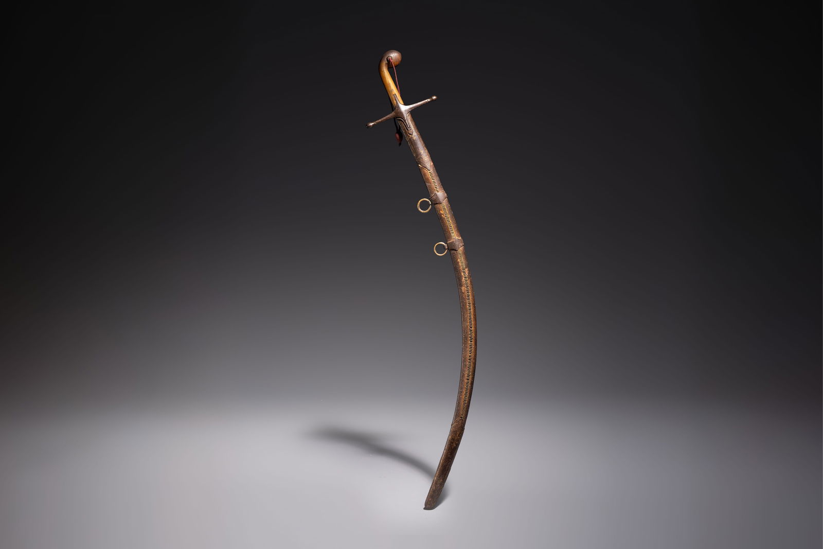 An Ottoman shamshir-type sabre with gilt-iron-mounted scabbard and horn hilt, Turkey, 19th C. (1 of 7)