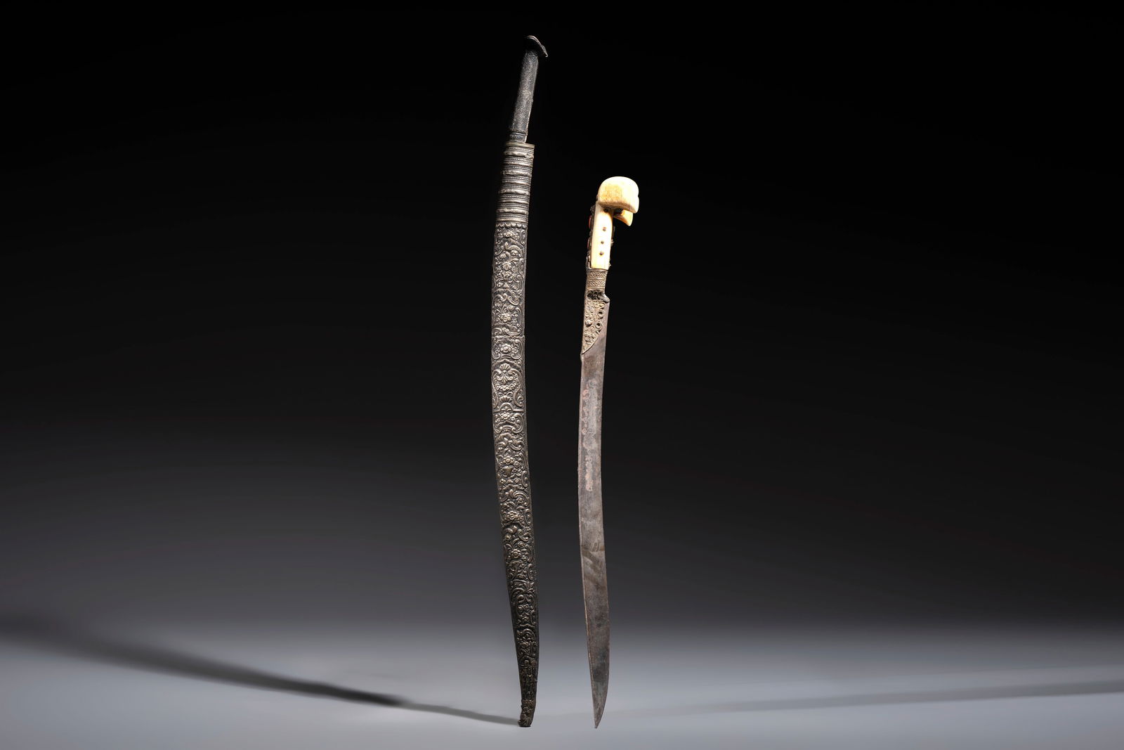 Two Ottoman yatagan swords, one with a silver scabbard, Turkey, 19th C. (1 of 9)