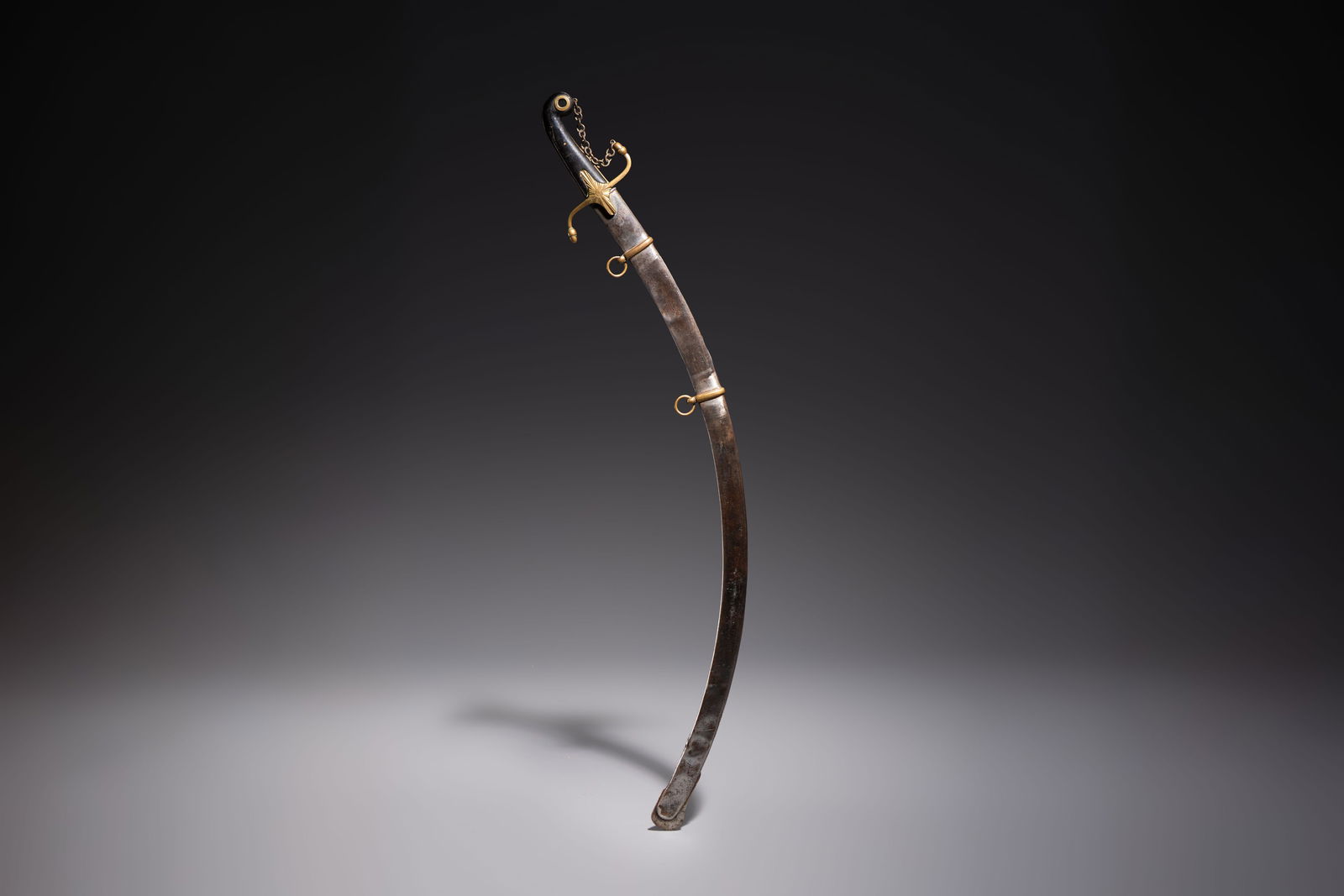 An Ottoman officer's engraved shamshir-type sabre with a gilt-bronze and wooden hilt, Turkey, 19th (1 of 7)