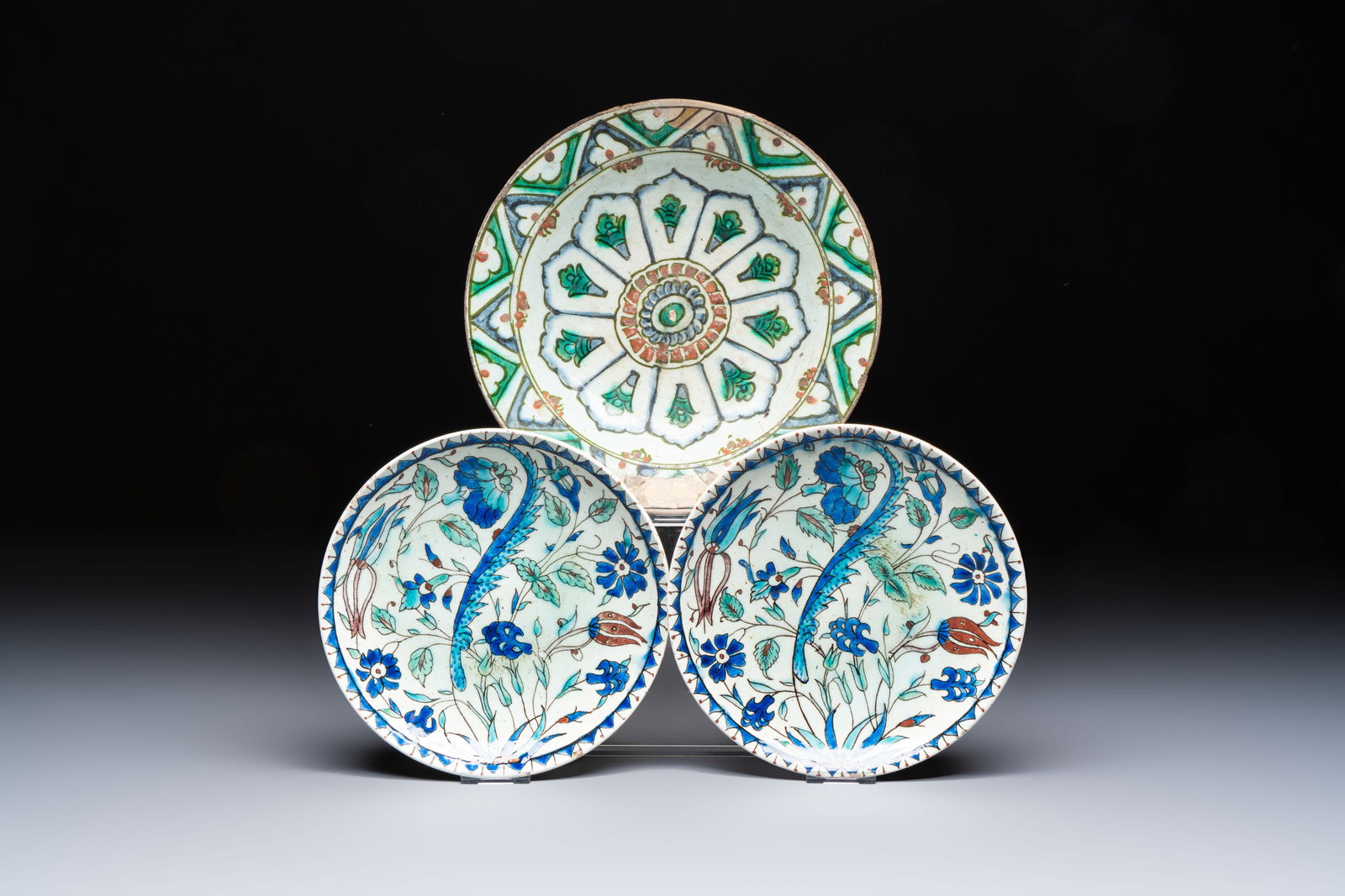A polychrome Iznik pottery plate and two Kutahya plates, Turkey, 16/19th C. (1 of 5)