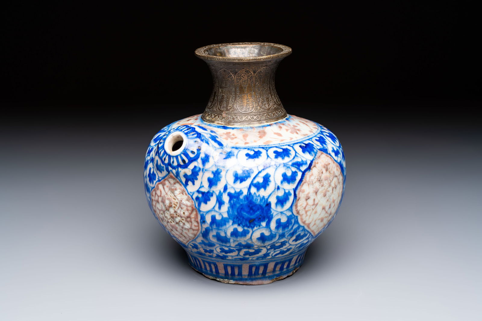 A Safavid blue, white and red pottery hookah base or kendi, Kirman, Persia, 17th C. (1 of 7)