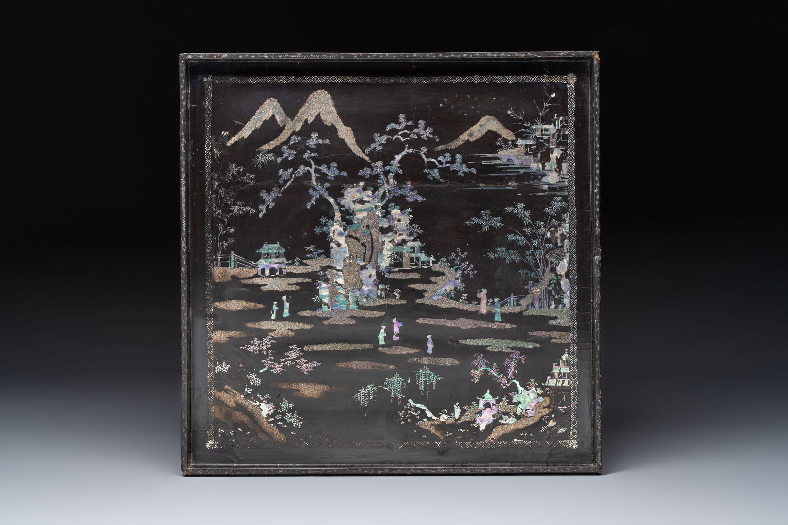 A rare large square Chinese laque burgauté tray depicting a mountainous garden, Kangxi (1 of 3)